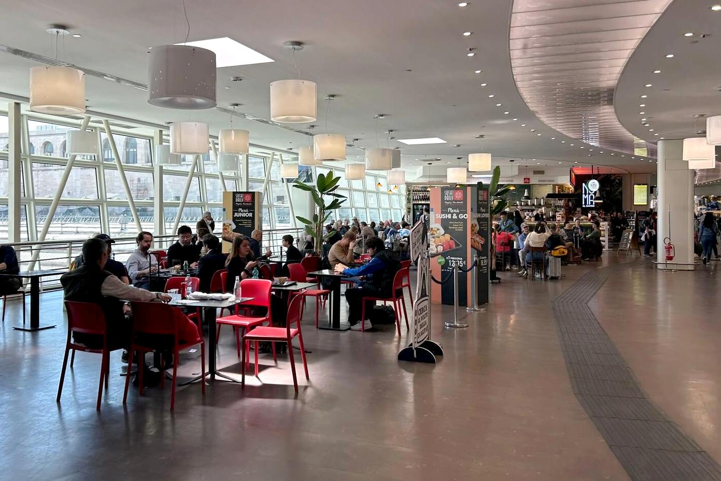 Roma Termini food court upstairs showing people at tables